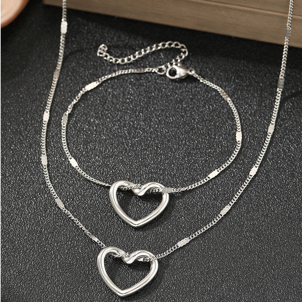 Jewelry Set (Necklace + Bracelet) Twisted Heart in Stainless Steel - Luxury and Sophistication for Special Moments