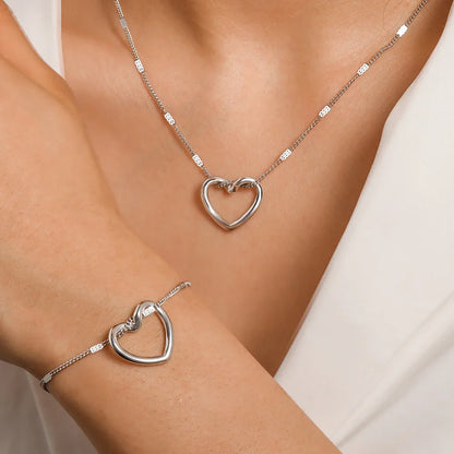 Jewelry Set (Necklace + Bracelet) Twisted Heart in Stainless Steel - Luxury and Sophistication for Special Moments